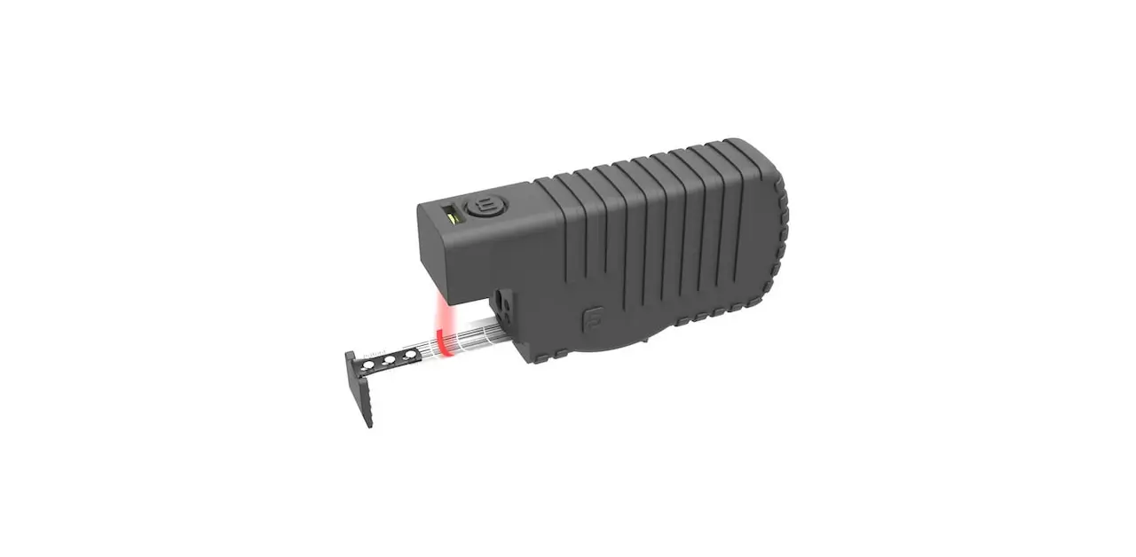 A Black And Red Electric Device Featuring A Prominent Red Light, Indicating Its Operational Status