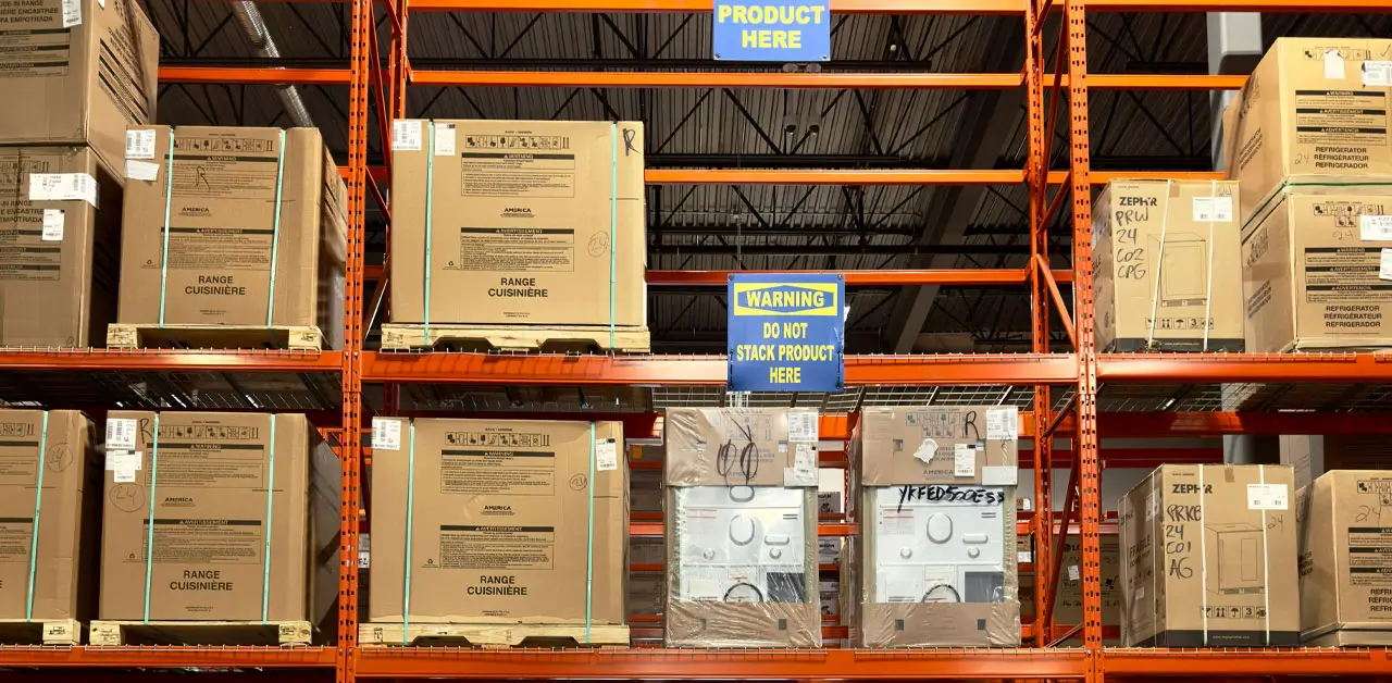 A Spacious Warehouse Filled With Stacked Boxes And Organized Shelves, Showcasing A Busy Storage Environment